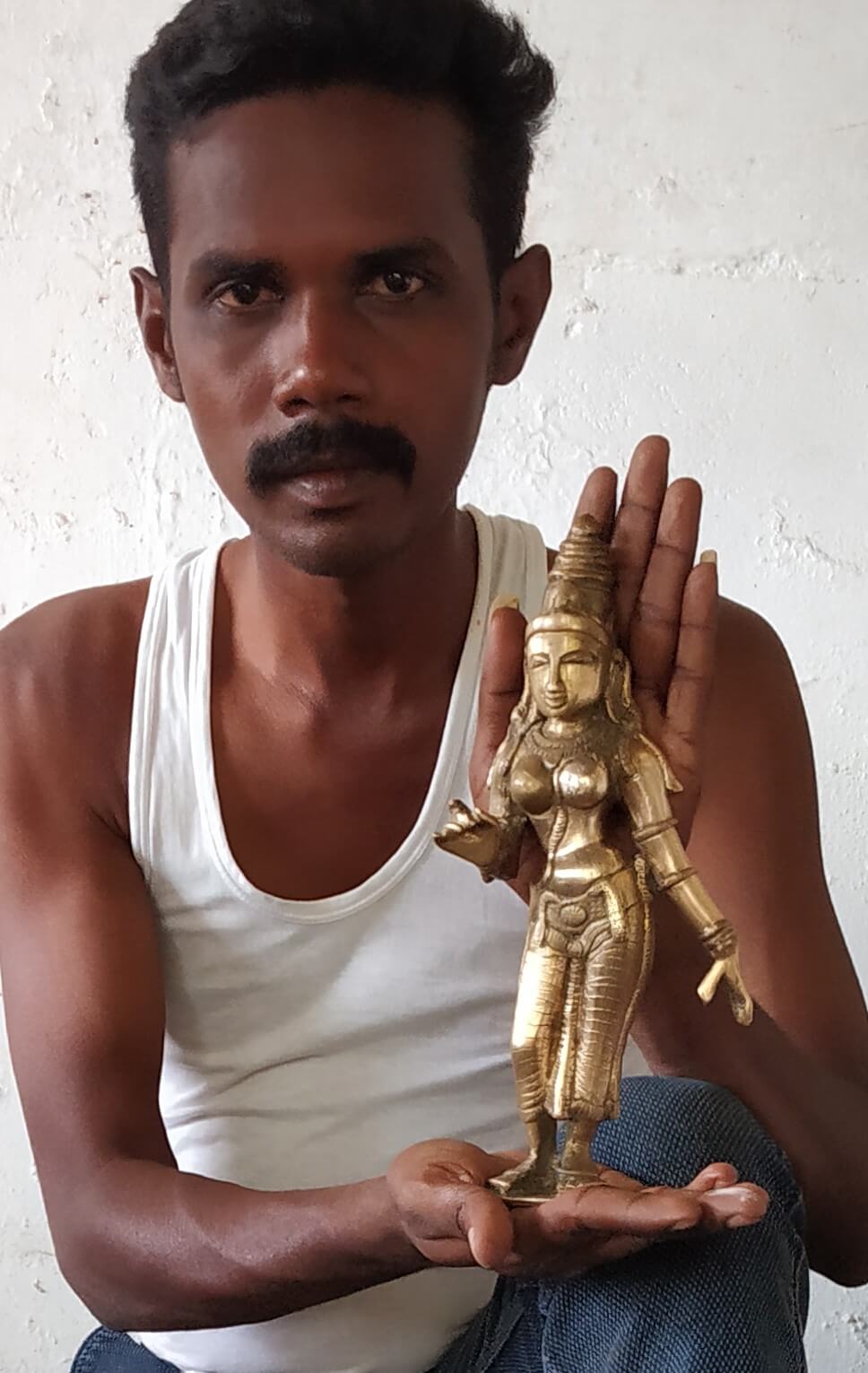 Bronze statue craftsman in Tanjore, Tamil Nadu, South India